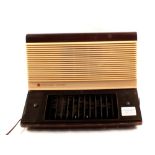 A Pye wood and Bakelite mains radio (collectors item only) plus a sewing machine