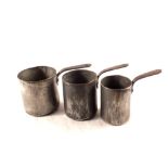 A graduated set of three small 19th Century tinned and seamed copper saucepans,