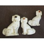 Three large Victorian Staffordshire dogs