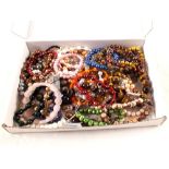 A quantity of bead bracelets including tigers eye, quartz, agate and cultured pearls,