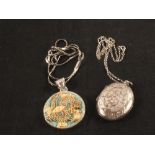 A vintage silver locket and chain plus a bone and silver Chinese carved pendant