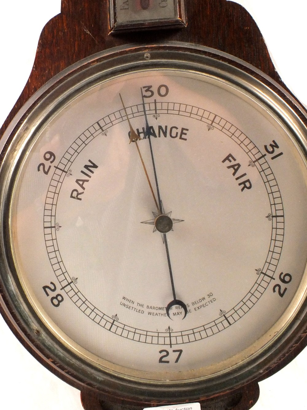 An aneroid barometer in carved oak case - Image 2 of 2