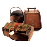 A mahogany coal box and copper coal helmet plus a vintage carpet bag