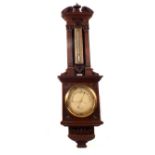 A 19th Century Negretti & Zambra aneroid barometer in carved oak architectural case, No.