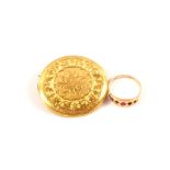 An 18ct gold brooch made from back of fob watch plus a 15ct gold ring (missing stones)