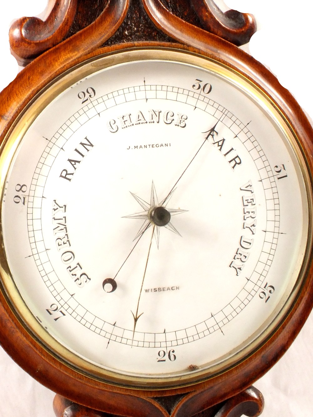 An aneroid barometer in shell and shield carved oak case, signed J. - Image 2 of 2