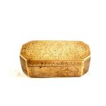 A 19th Century Islamic brass tobacco box of elongated hexagonal form with all over engraved