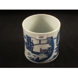 A Chinese blue and white porcelain cylindrical brush pot hand painted with dignitaries and