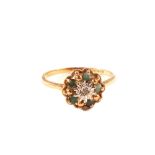 A 9ct gold diamond and emerald ring,