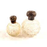 Two silver top cut glass scent bottles