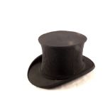 A folding top hat by Hillgate & Co,