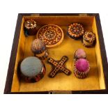 A floral Tunbridge ware box containing two combined waxer emery's, waxer, emery pin cushion,