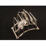 An unusual Victorian Arts and Crafts toast rack,