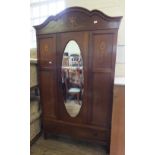 An Edwardian inlaid mahogany mirror door wardrobe