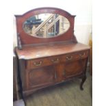 An Edwardian mirror back sideboard