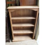 A pine four tier open bookcase