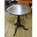 A 19th Century circular mahogany tripod table