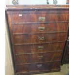 A Victorian mahogany chest of six long oak lined drawers with brass drop handles