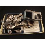 A cased set of six silver coffee spoons plus other silver cutlery