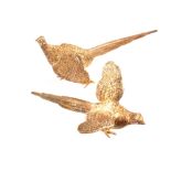 A pair of small silver models of pheasants by C.J.