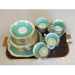 A Hughes & Co Paladin green decorated part tea set