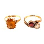 A 9ct gold citrine ring (cut) plus a yellow metal two stone crossover ring