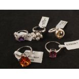 A group of five silver stone set rings including citrine,
