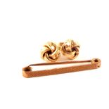 A pair of 9ct gold earrings plus a bar brooch