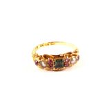 An 18ct gold pearl, emerald and amethyst ring,