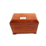 A Regency twin compartment inlaid partridge wood tea caddy with later bracket feet