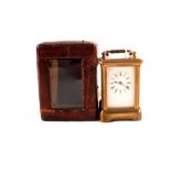 A Richard & Co French brass cased carriage clock with key