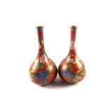 A pair of Chinese floral cloisonne vases,