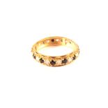 A 9ct gold full eternity ring,