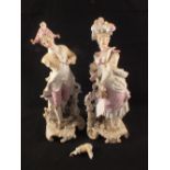 A pair of 19th Century French bisque figurines (one detached arm)