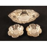 A pair of small silver pin trays,
