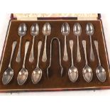 A cased set of twelve silver teaspoons and tongs