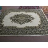 A machine made floral Persian pattern carpet