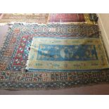 A Chinese yellow and blue rug plus a Persian rug (as found)