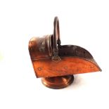 A 19th Century copper coal helmet plus a singer sewing machine