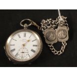 A gents silver cased pocket watch, chain and two Alberts,