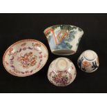 An 18th Century Chinese Famille Rose tea bowl and saucer plus two bowls (two pieces as found)