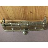 A heavy 19th Century brass fender,