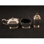 A silver condiment set,