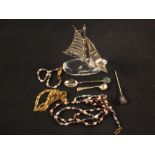 A sterling silver sail ship on glass base plus costume jewellery