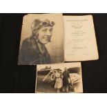 A signed and inscribed photo of Amy Johnson in flight attire plus two other items