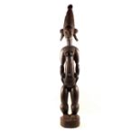 A large West African tribal maternity figure,