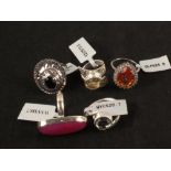 A group of five silver stone set rings including citrine, topaz,
