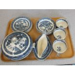 A Wedgwood Willow pattern part dinner and tea set (two trays)