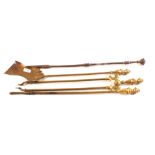 A set of three brass fire irons plus a steel poker