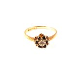 A 9ct gold diamond and sapphire cluster ring,